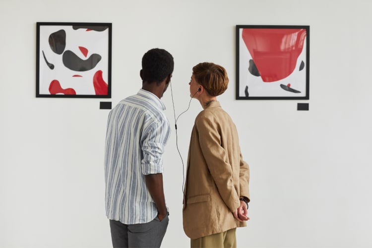 couple viewing art in a museum