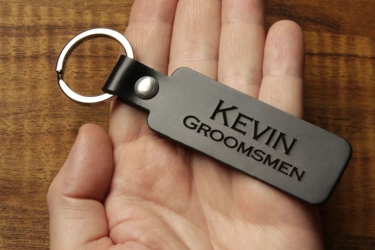 a leather groomsman keychain