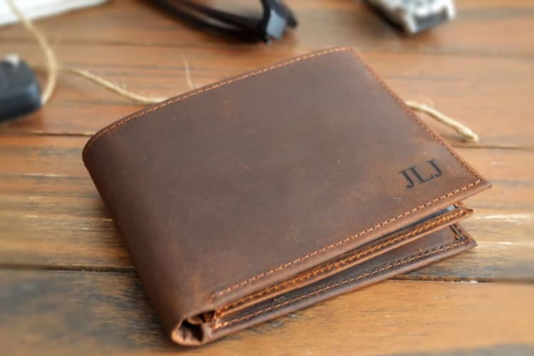 An engraved wallet is a great best man gift.