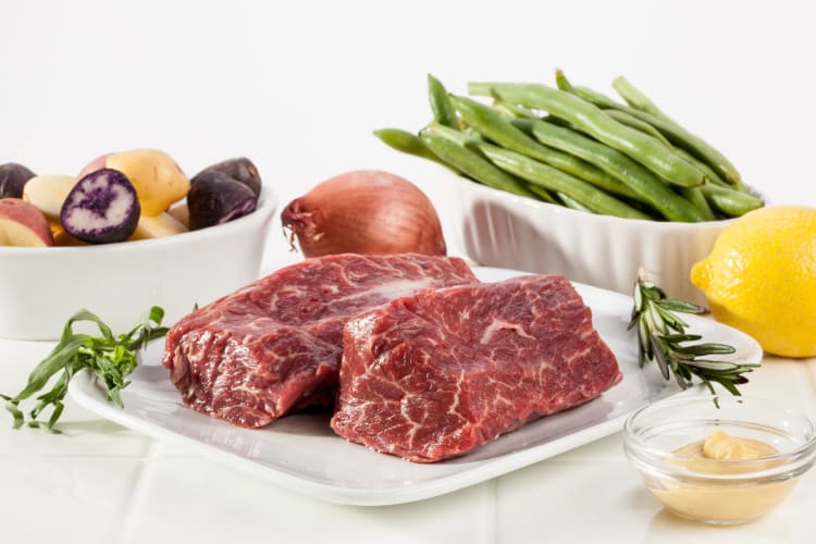 raw hanger steak showing marbling