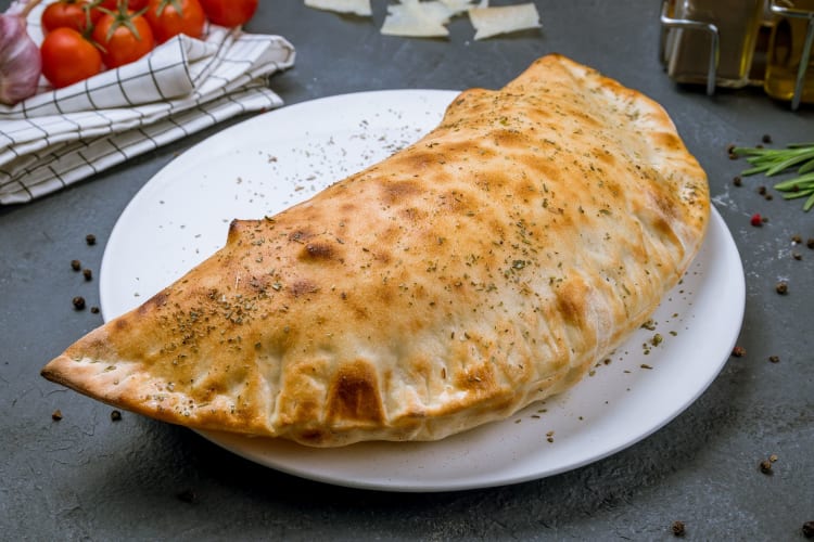 a stuffed, closed calzone