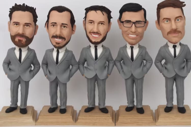 a row of bobblehead groomsmen