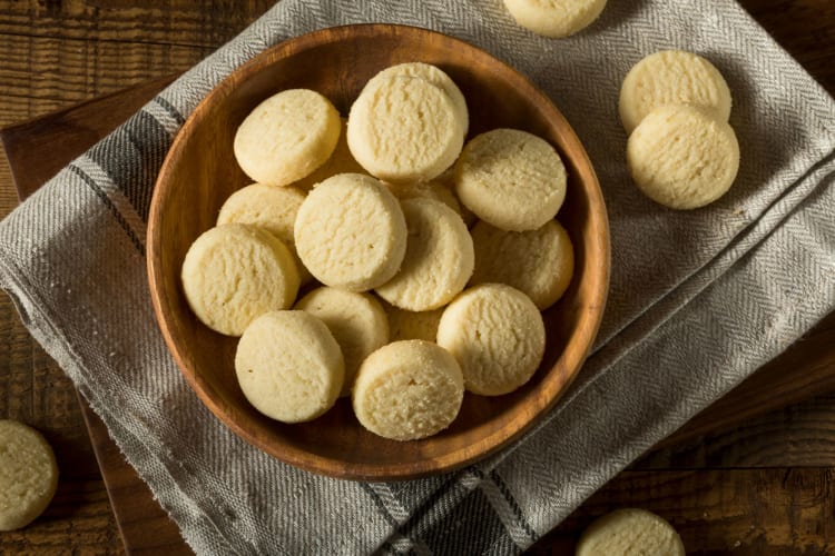 Aerial view of shortbread cookies in a wooden bowl