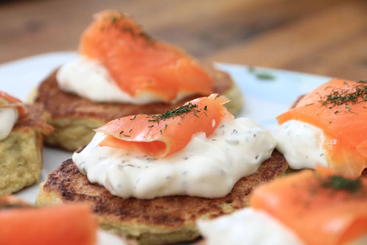 salmon blinis with sour cream topping