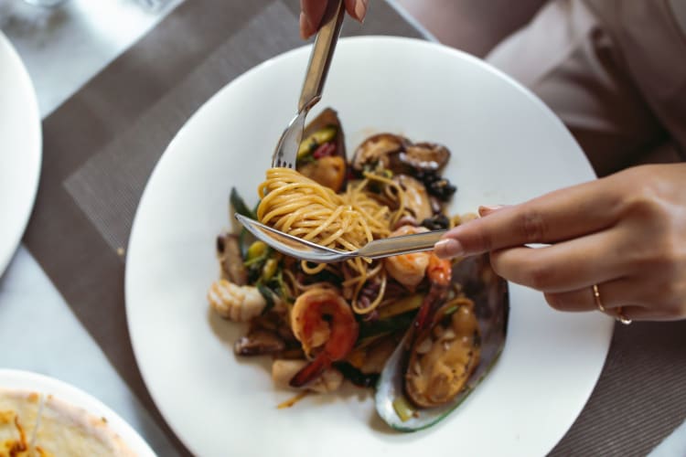 Wipe the edges of the plate when plating food.