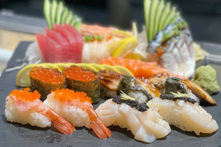 Various types of sushi with fresh seafood