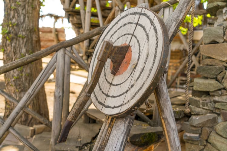 One of the unique date ideas in Salt Lake City is axe throwing