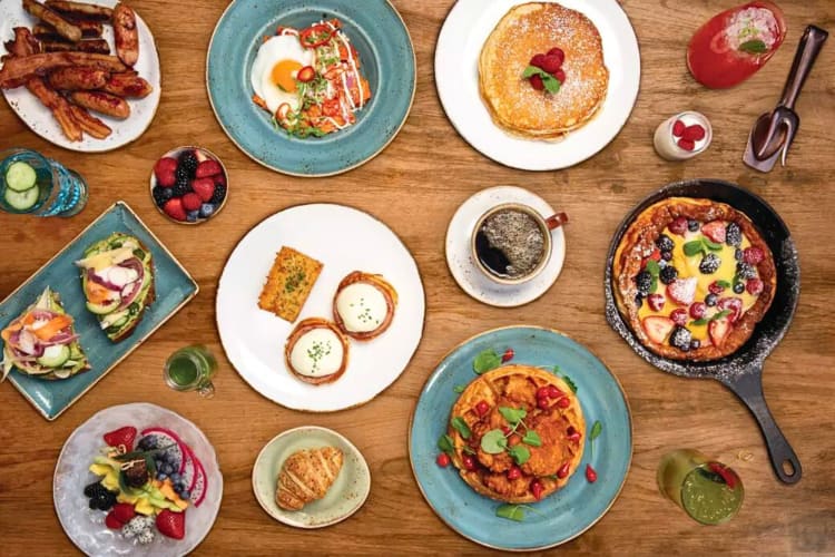 Aerial view of a variety of meals from Salt & Ivy Café and Patio Bar