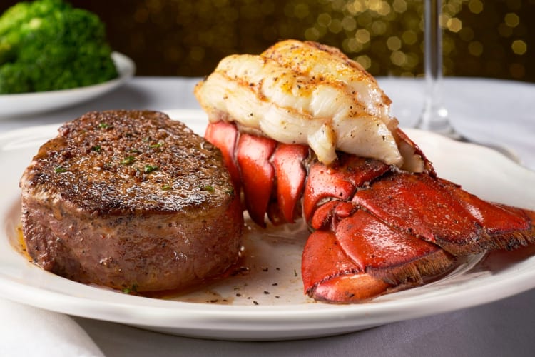 Steak and lobster on a plate