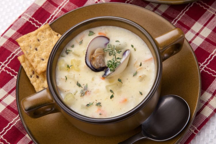 Order some clam chowder to pair with your crab cakes at Faidley's Seafood.
