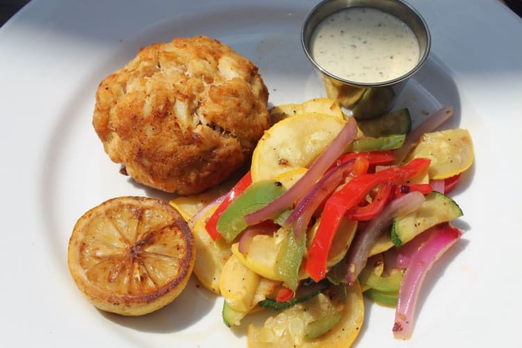 Start with the mini fried crab cakes when you visit Mama's on the Half Shell.