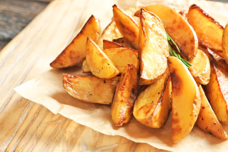 Seasoned potato wedges