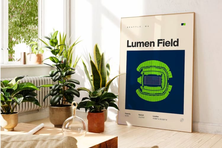 A framed poster that says Lumen Field next to a stadium graphic