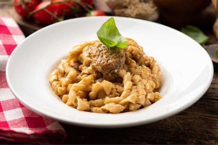 A bowl of pasta with pesto alla Trapanese