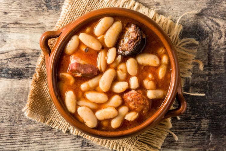 A bowl of fabada, a comforting Spanish food