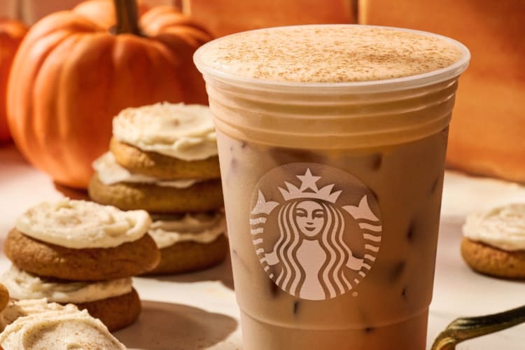 A Starbucks drink next to cookies