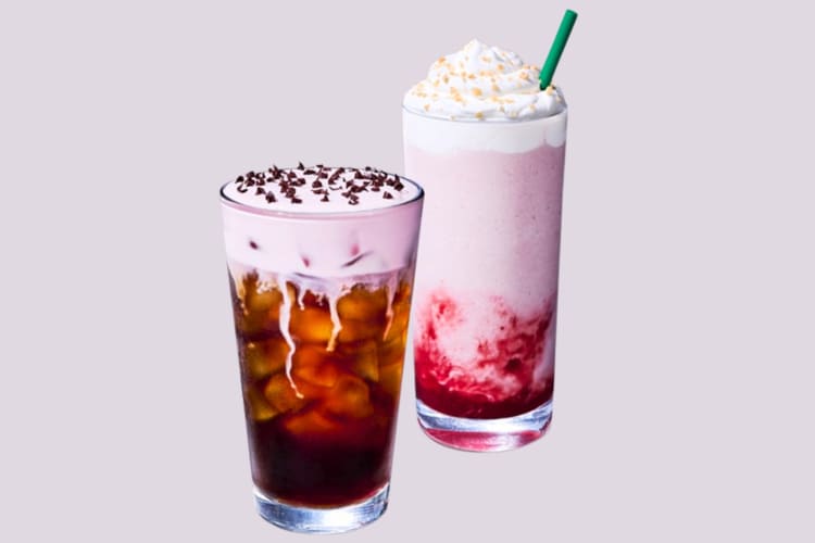 A cold brew with pink foam and another pink drink from Starbucks