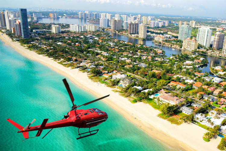 A helicopter above a beach town 