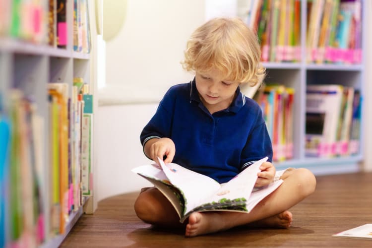 Reading new books is a fun summer bucket list idea for kids