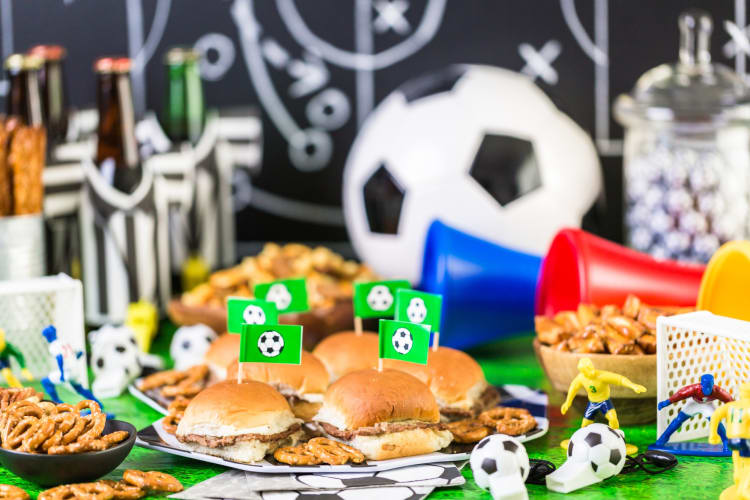 Sports themed food and decorations on a table