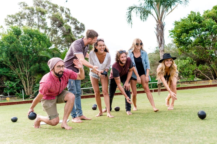 People playing lawn games