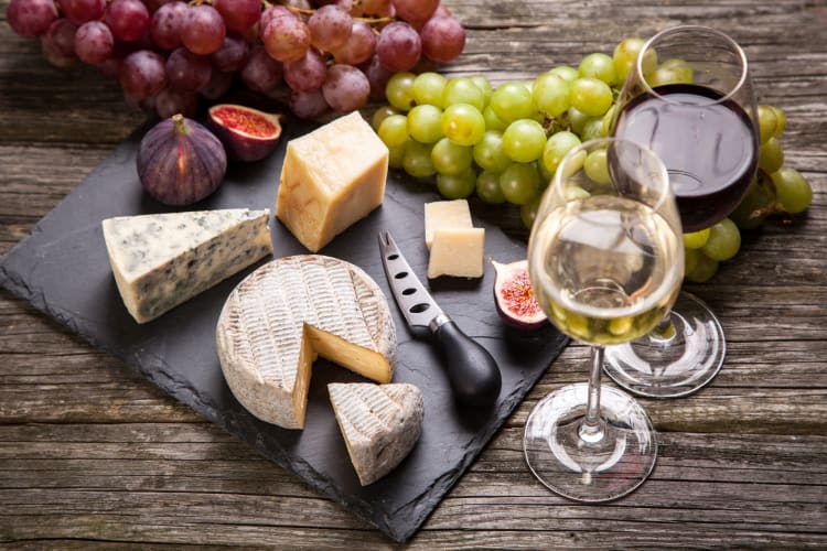 Wine and cheese tasting is a sophisticated summer party theme