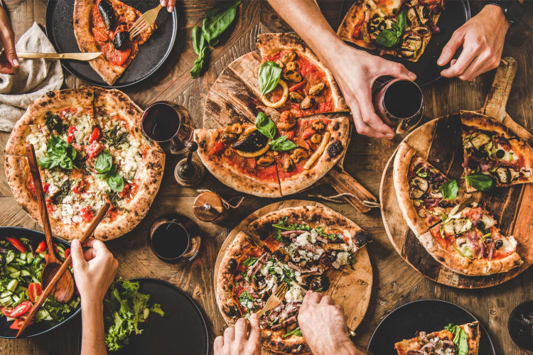 A selection of pizza on a table
