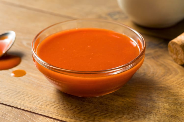 A bowl of red sauce