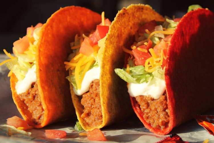 Three hard shell tacos, including a dorito shell taco 