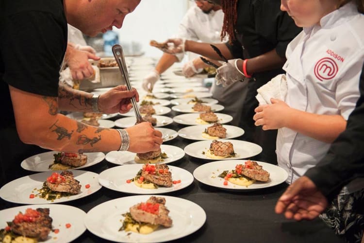 Chefs preparing meals at the Taste of Chicago food festival