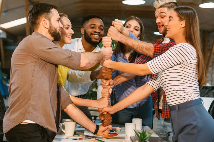 People participating in workplace team building activities