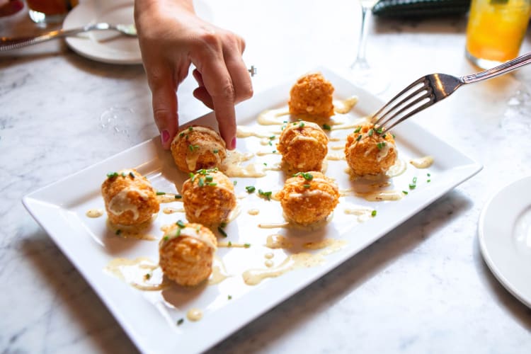 Taking a food tour is a great team building activity in Toronto