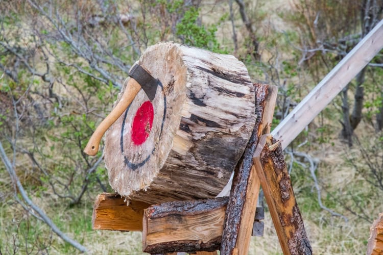 One of the fun team building activities in Naperville is axe throwing 