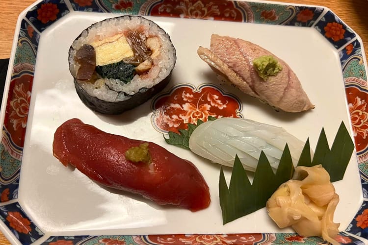 Aerial shot of four different pieces of sushi from Teppay Japanese Restaurant in Houston