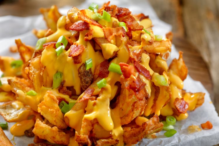 A popular Texas Roadhouse secret menu item is the Smothered Blossom With Jack Cheese