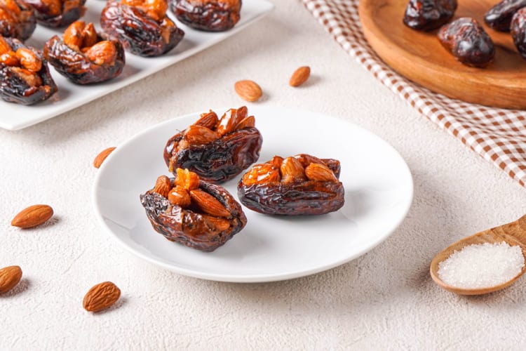 Stuffed dates are a sticky-sweet Thanksgiving appetizer your guests are sure to love.