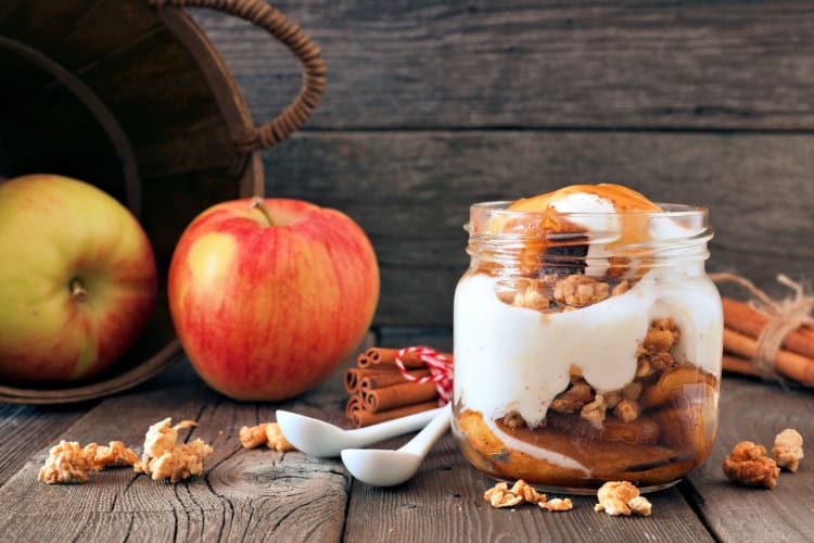 Apple yogurt parfait is a refreshing and delicious meal with which to start your day.