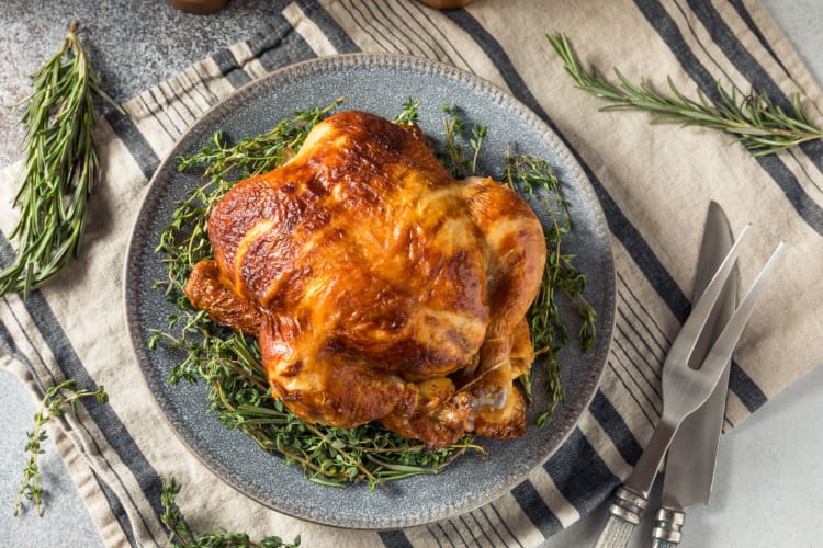 Consider roasting a chicken instead of a turkey to save yourself time and oven space on Thanksgiving.