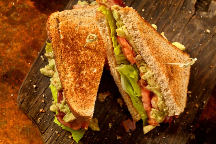 Top view of a BLT sandwich sliced in half