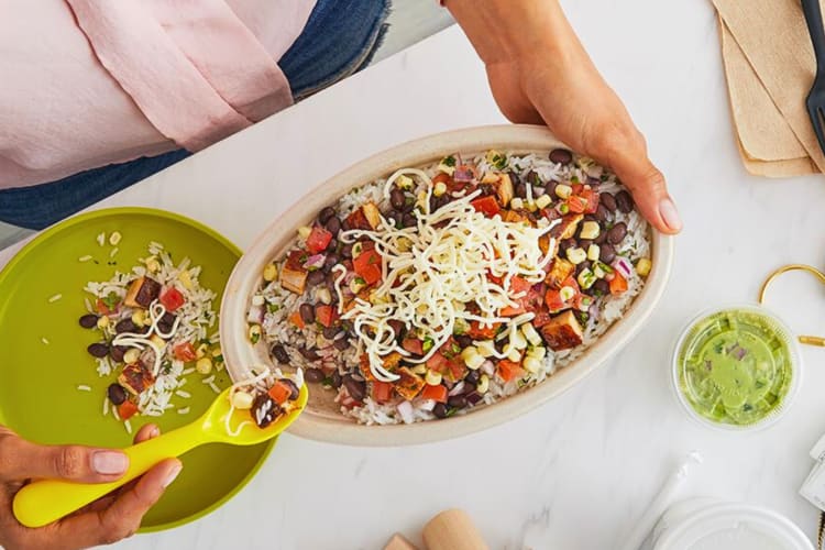 Healthy bowl from Chipotle with rice, beans, meat and veggie toppings