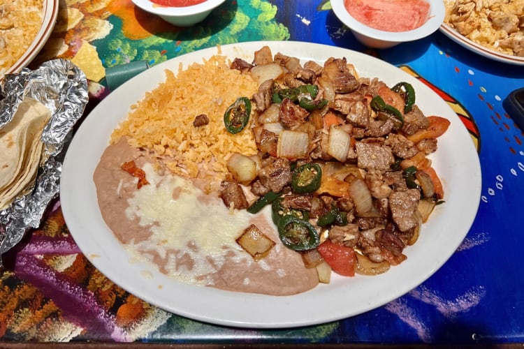 Meat and vegetable meal with rice from Tio's Diner in Columbus