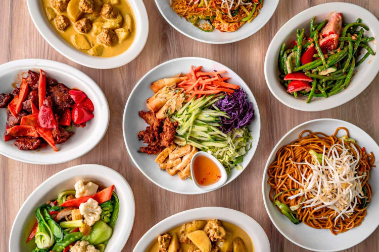 A selection of Asian-style dishes on a table