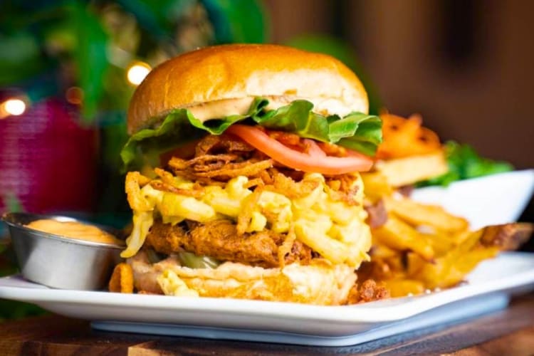 A burger with mac and cheese filling