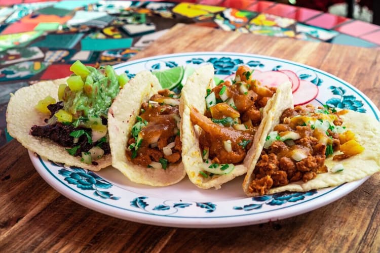 Four tacos from Vegan by El Zamorano, a restaurant in Orange County