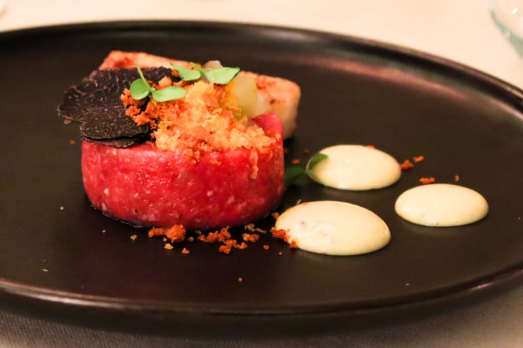 Tuna tartare on a black plate