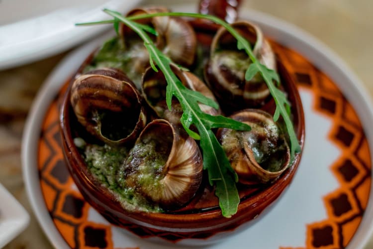 sea snails are a vietnamese delicacy enjoyed as a quick street food