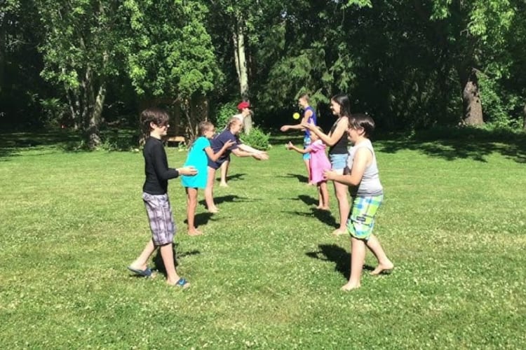 A fun family reunion idea like a water balloon toss always brings plenty of joy