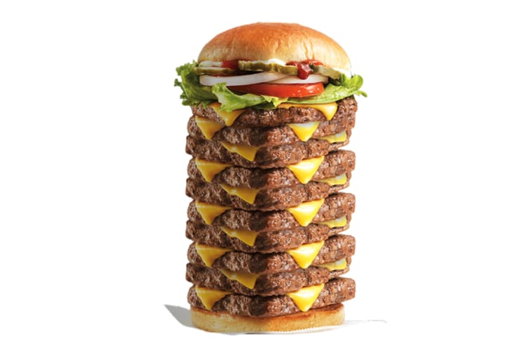 A cheeseburger with 10 patties