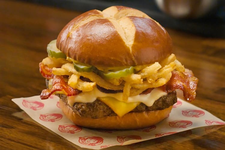 A burger with a pretzel bun from Wendy's
