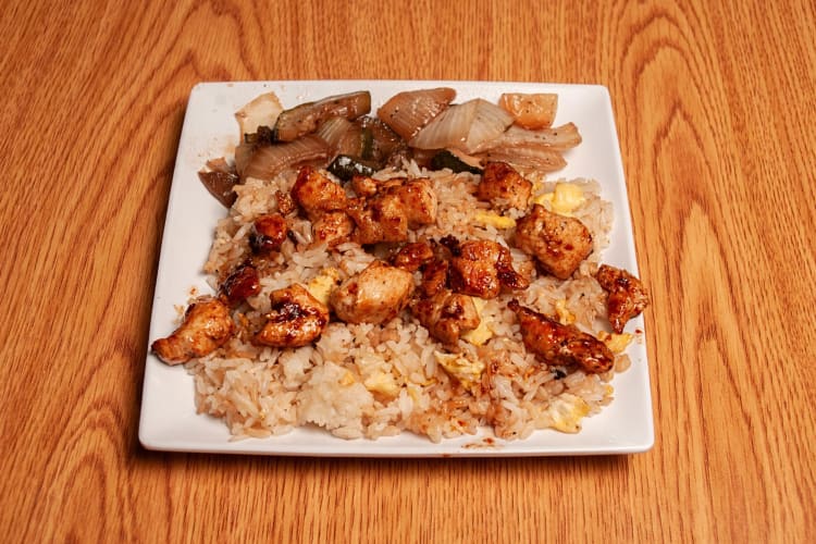 Japanese hibachi chicken on a white plate